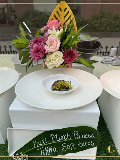 Here is our signature Kuti Mirch Paneer Tikka, reimagined as a soft taco. This dish perfectly marries the robust spice of Indian paneer tikka with a modern, handheld format, presented with artistic flair for an unforgettable first bite.