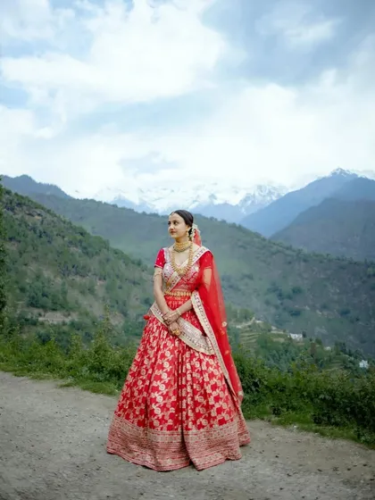 For the couples whose love story is an adventure, we travel to the ends of the earth. This breathtaking shot from a mountain wedding at Triyuginarayan captures the epic scale of both the landscape and their love.