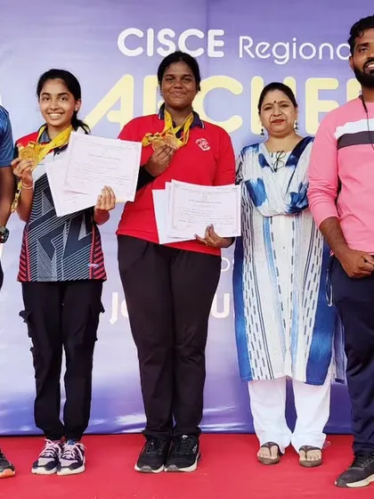 Posing with our two gold medalists from the CISCE Regional competition. Their success is a reflection of the entire academy's commitment.