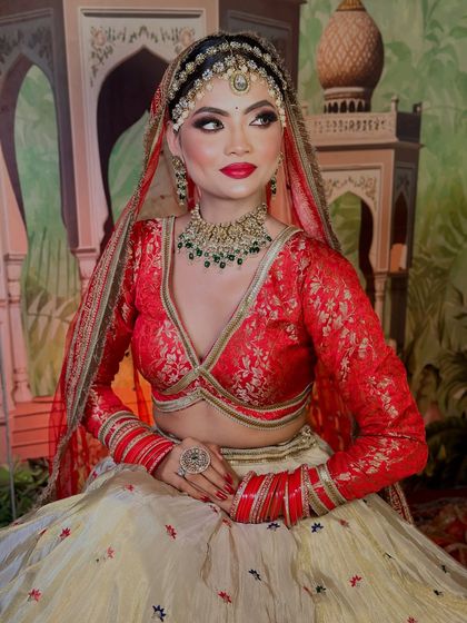 A simple and elegant portrait. The focus is on the clean, flawless makeup that enhances the bride's natural beauty.