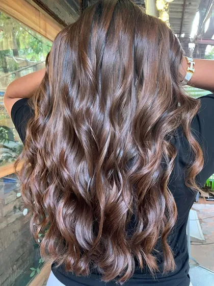 The back view of the 'Betel Nut' hair. The color is a beautiful, warm, and rich brown that's perfect for any season.