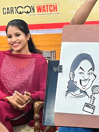 This picture says it all. The pure, uncontainable joy on a guest's face after seeing her caricature for the first time is the reason I love what I do.