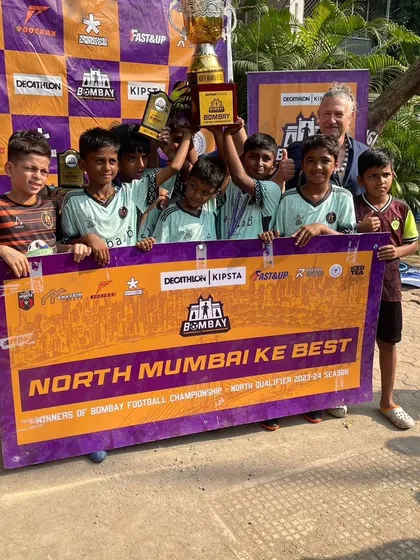 "North Mumbai Ke Best!" Our U11 players holding their trophy and the banner high after winning the Bombay Championship.