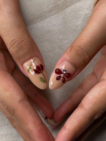 When 3D meets chrome and marble, it's a whole vibe. This custom set features intricate 3D florals and dragonfly art on a rich burgundy and nude base.