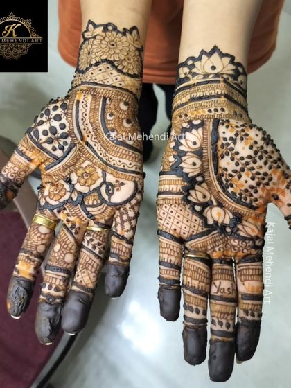 The back-hand design for a wedding guest, featuring a beautiful floral cuff and dotted patterns that give it a modern yet traditional feel.