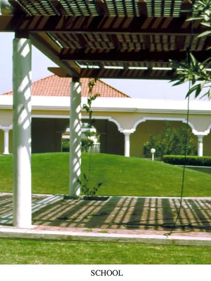 The landscape of Babrala School features sculpted earth mounds and covered walkways. This approach to site planning creates visual interest and provides shaded, comfortable outdoor spaces that have stood the test of time.