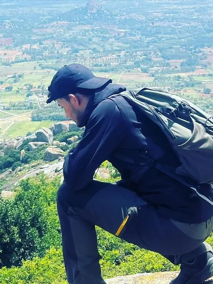 Overlooking the valley from Shivagange. The terrain here is a mix of rock-cut steps and natural trails, offering a great workout.