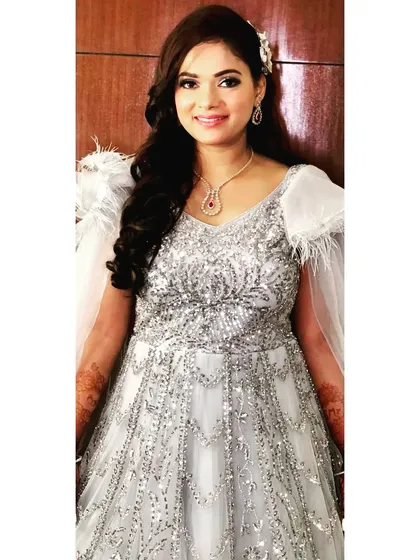Sparkle on! My beautiful Roka stunner in her glittering silver gown. The makeup is equally sparkly and glamorous to match.