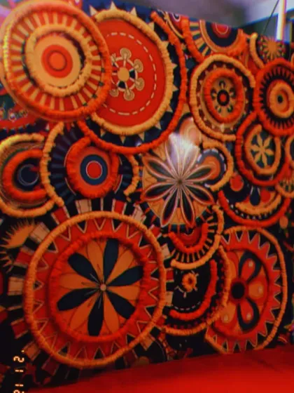 For a Sangeet night that stands out, I created this highly artistic and colorful backdrop. The design features intricate, layered circular patterns that add incredible texture and energy to the celebration, ensuring a memorable party atmosphere.