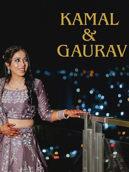 A modern bridal portrait against a city skyline at night. The bokeh of the city lights adds a touch of glamour to her reception look.
