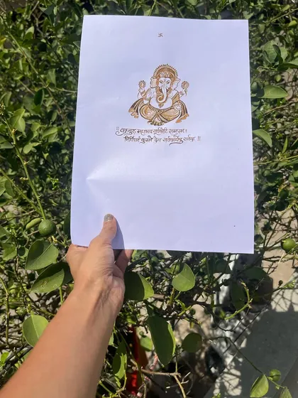 This image shows the Ganesha artwork held up, giving you an idea of the scale and detail. Practicing on paper is an important step in my teaching method to build your skills.