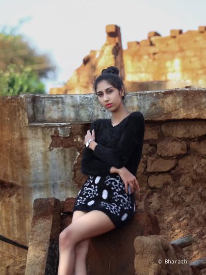 Using the texture of old, rustic walls as a backdrop for a modern fashion portrait. The contrast between old and new is always interesting.