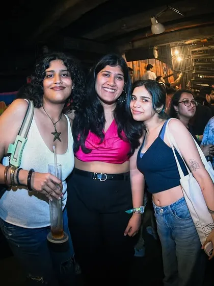 Friends posing for a picture together.