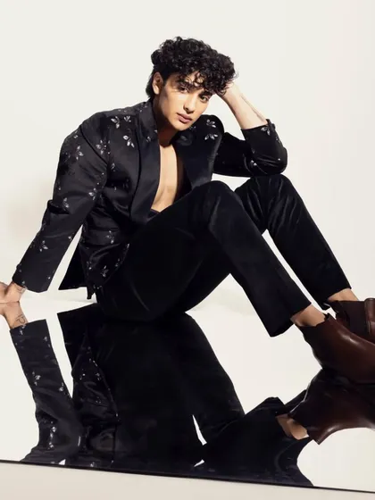 Yes, I do men's makeup too. For this fashion portfolio shoot, the goal was a clean, crisp look that defined the model's features for the camera without looking heavy. I focused on natural skin enhancement and subtle contouring, ensuring he looked sharp and confident.