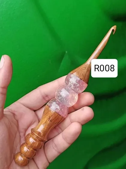 This is one of my favorite handcrafted hooks. It combines a smooth wooden shaft with a beautiful, ergonomic resin handle that makes crocheting for hours super comfortable. Each one is unique and made with a lot of love.