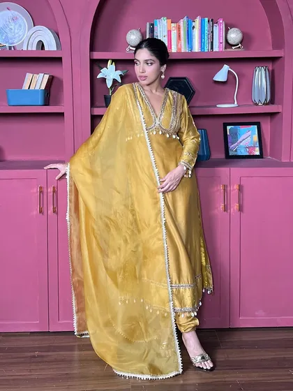 For her birthday, I styled Bhumi Pednekar in this vibrant yellow salwar suit. The intricate silver embroidery on the neckline and the flowing dupatta make it a cheerful and celebratory outfit.