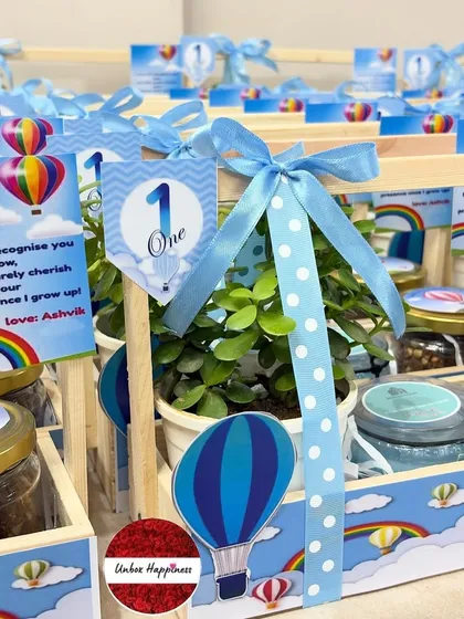 This image highlights the personalized thank you card and the cheerful rainbow and hot air balloon graphics.