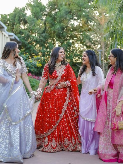 A fun, happy moment between the bride and her squad. Her makeup is designed to last through all the laughter and dancing.