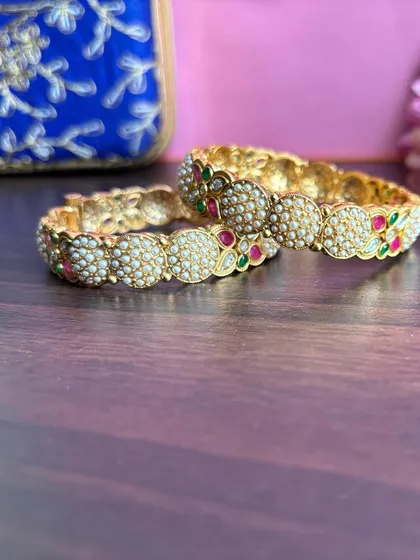 A full view of the beautiful pearl cluster bangles.