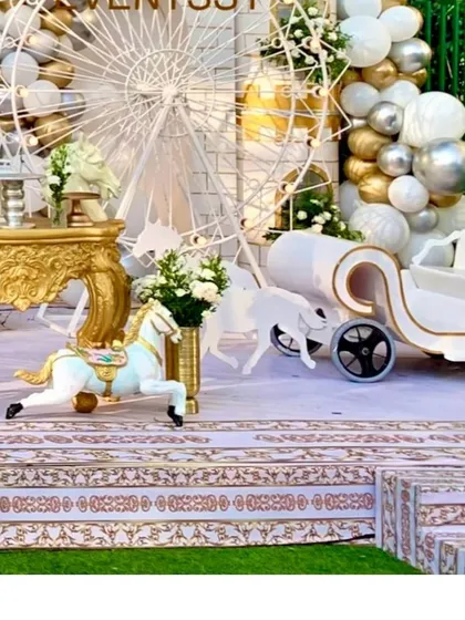 A detail shot of the themed flooring and carousel horse, part of the immersive decor for the royal prince party.