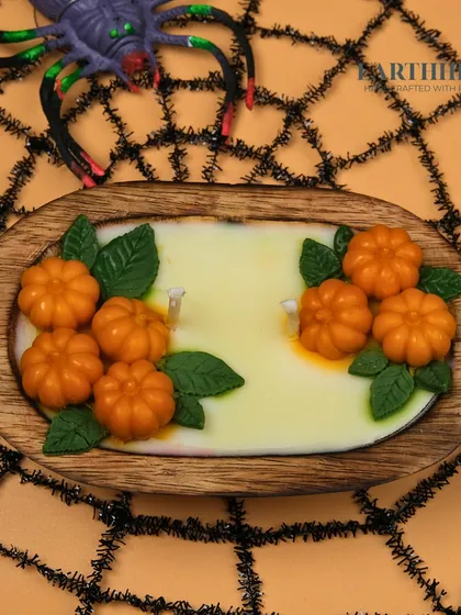 My pumpkin patch candle in a wooden dough bowl is perfect for Halloween or autumn decor.