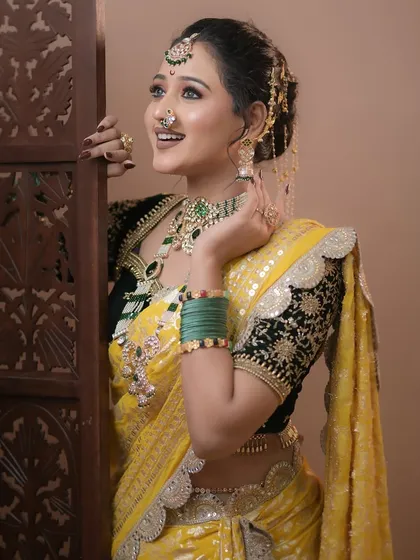 A joyful candid moment. The long-lasting makeup ensures that the bride looks fresh and radiant throughout the day's events and celebrations.