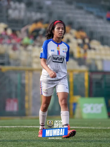 A player from our girls' team in action during a DPDL Mumbai league match. We field teams across all age categories to ensure a continuous development pathway.