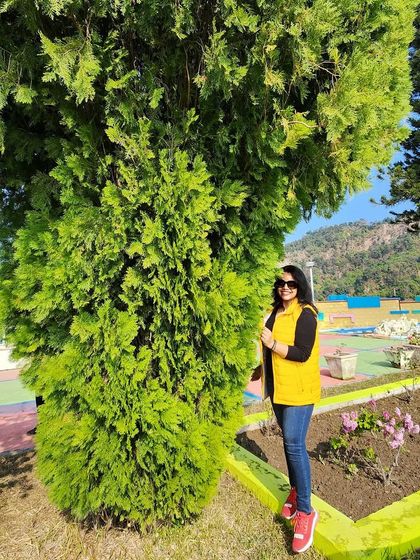 A full-length shot of the winter travel outfit, showing how to stay warm and stylish with layers.