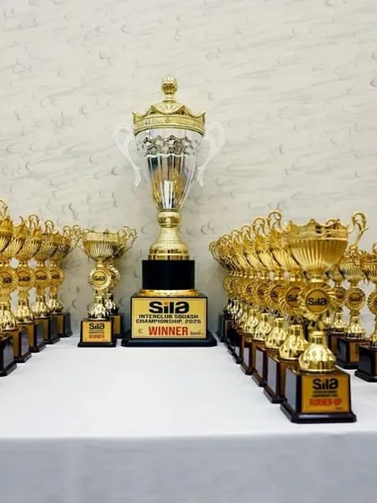 The ultimate prize. The trophies for the SILA Inter-Club Squash Championship waiting for their champions, representing the prestige and scale of our tournaments.