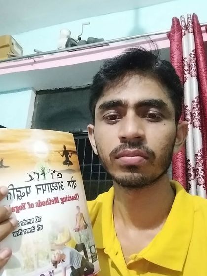 One of my dear students with my book on yoga teaching methods. Seeing my students embrace and share this knowledge is the greatest reward.