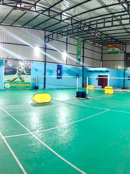 A wide view of our professional indoor badminton courts. We provide a well-lit, spacious, and fully equipped environment for players to train and excel.