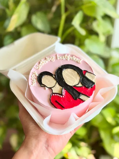 A personalized bento cake that turns a photo into an illustration. This one captures a sweet moment between a mother and daughter, making for a memorable birthday surprise.