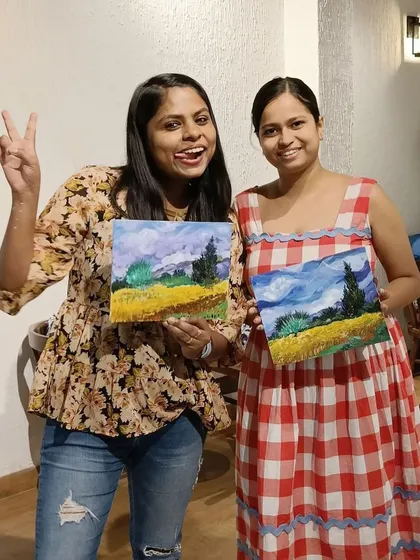 The pure joy of finishing your painting! These two absolutely nailed their landscape paintings and had so much fun doing it.