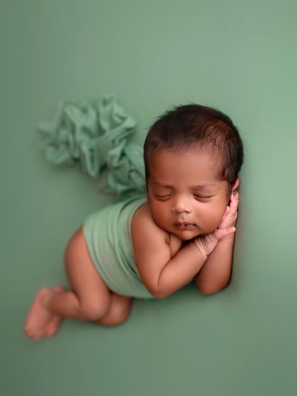 Another look at this classic pose. I love how peaceful and content babies look when posed this way.