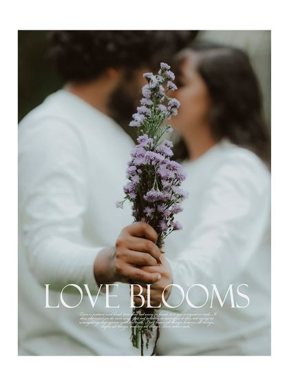 An artistic close-up of the couple holding a bouquet of purple flowers, their faces blurred in a romantic kiss.