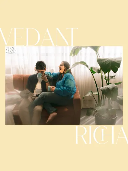 A playful moment from the coffee-themed shoot, capturing the fun and laughter between Vedant and Richa.
