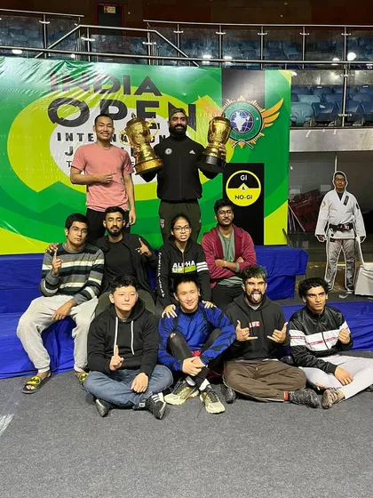 Celebrating with my team after a successful tournament at the India Open. We win and lose as a team.