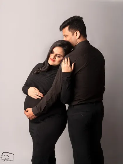A tender and protective embrace. This classic pose is beautifully captured in a simple and modern style.