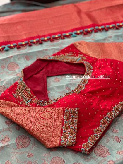 Another view of the red bird motif blouse.