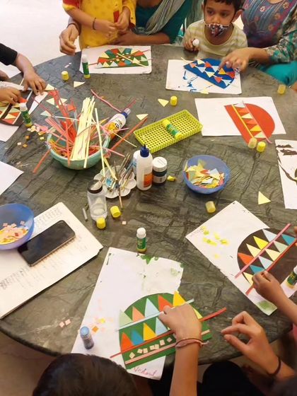 A different angle of the busy craft table. We provide a variety of materials to encourage exploration and creativity.