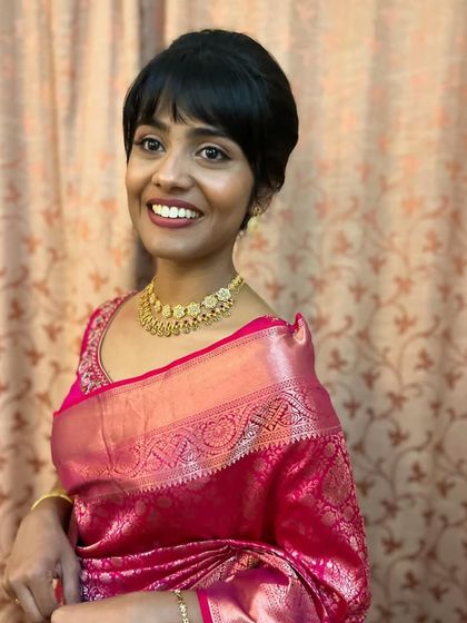 Another shot of Shruti's elegant reception look. The makeup highlights her beautiful smile and glowing skin.