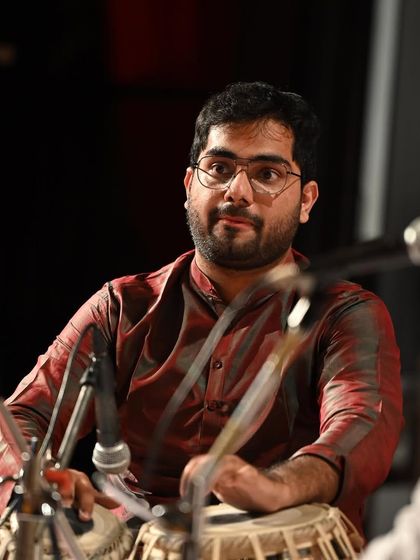 A close up shot from the concert with Pandit Jayateerth Mevundi sir, focusing on the interaction and listening that is key to accompaniment.