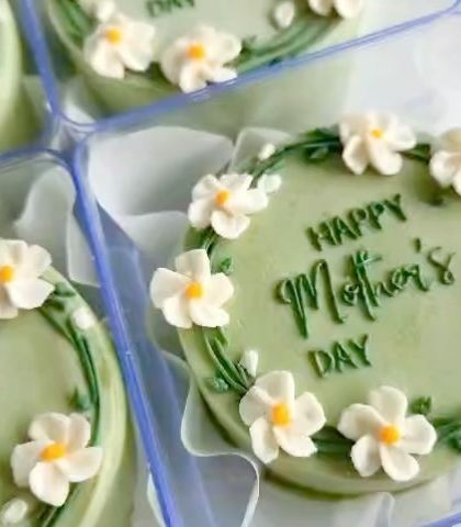 A close-up of our Mother's Day mini bento cakes. We created this simple, elegant design with a wreath of tiny white flowers. It was a sweet gift for all the amazing mamas.