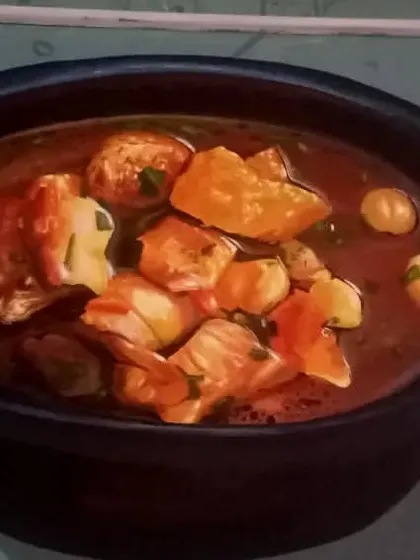 A still life painting of a bowl of curry. I use rich colors and focus on light and shadow to make even simple, everyday subjects feel vibrant and compelling.