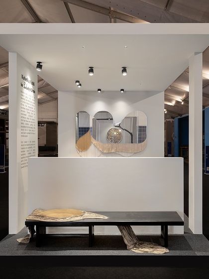 Our curated stall for the EDIDA India 2023 awards, where I was honored as Designer of the Year. The display features the 'Cosmic Bench' and the 'Flapper Mirror', showcasing our exploration of material, form, and the boundary between furniture and art.