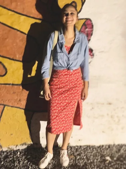 This look is a perfect example of smart layering. I styled a fitted Zara dress with an oversized denim shirt from Mango, tied at the waist for definition. This not only adds interest but also makes the dress wearable across different seasons.