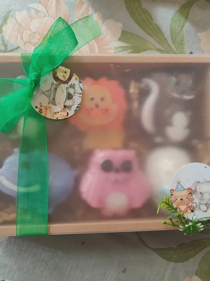 A gift box of assorted animal-themed soaps, perfect for a jungle or zoo party.