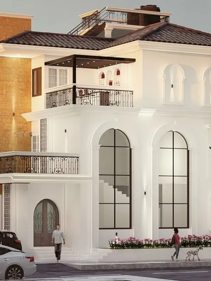 We pride ourselves on our stylistic versatility to match every client's vision. This proposed residence in Hubli explores a European-inspired design with classic arches and clean white walls, complete with charming window planters that add a touch of green elegance.