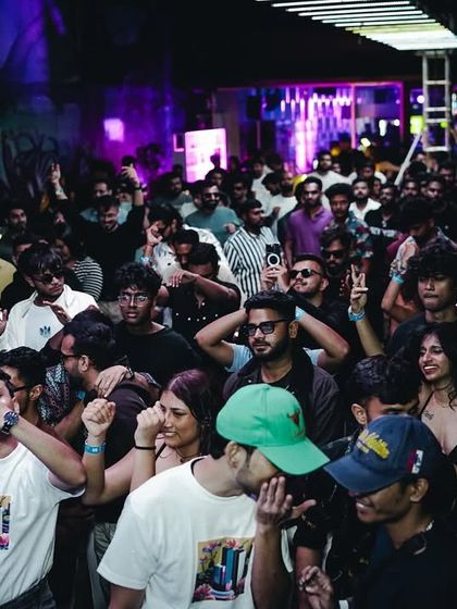 A crowd shot from a B2B set, showing the excitement of the audience. These special artist pairings are a huge draw for my events.