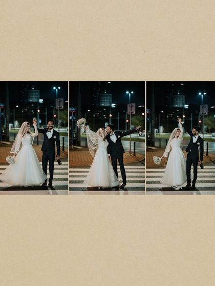 A playful and modern take on a wedding portrait, with the couple striking poses on a crosswalk at night.